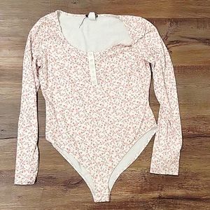 Woman's floral bodysuit small